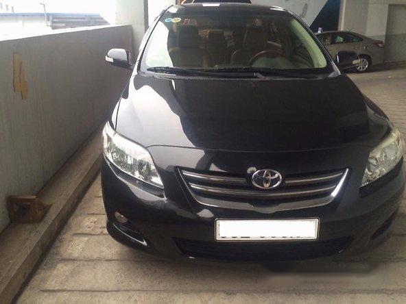 Toyota Corolla altis 2009 - Chính chủ bán gấp Toyota Corolla altis đời 2009, màu đen