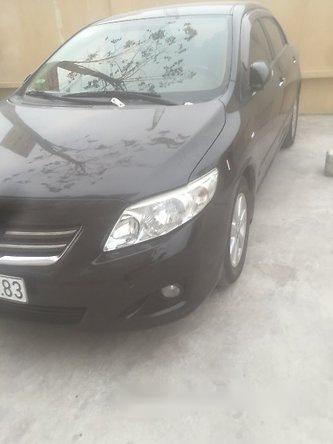 Toyota Corolla altis 2009 - Chính chủ bán gấp Toyota Corolla altis đời 2009, màu đen