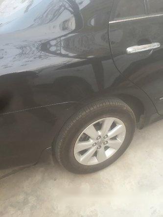 Toyota Corolla altis 2009 - Chính chủ bán gấp Toyota Corolla altis đời 2009, màu đen