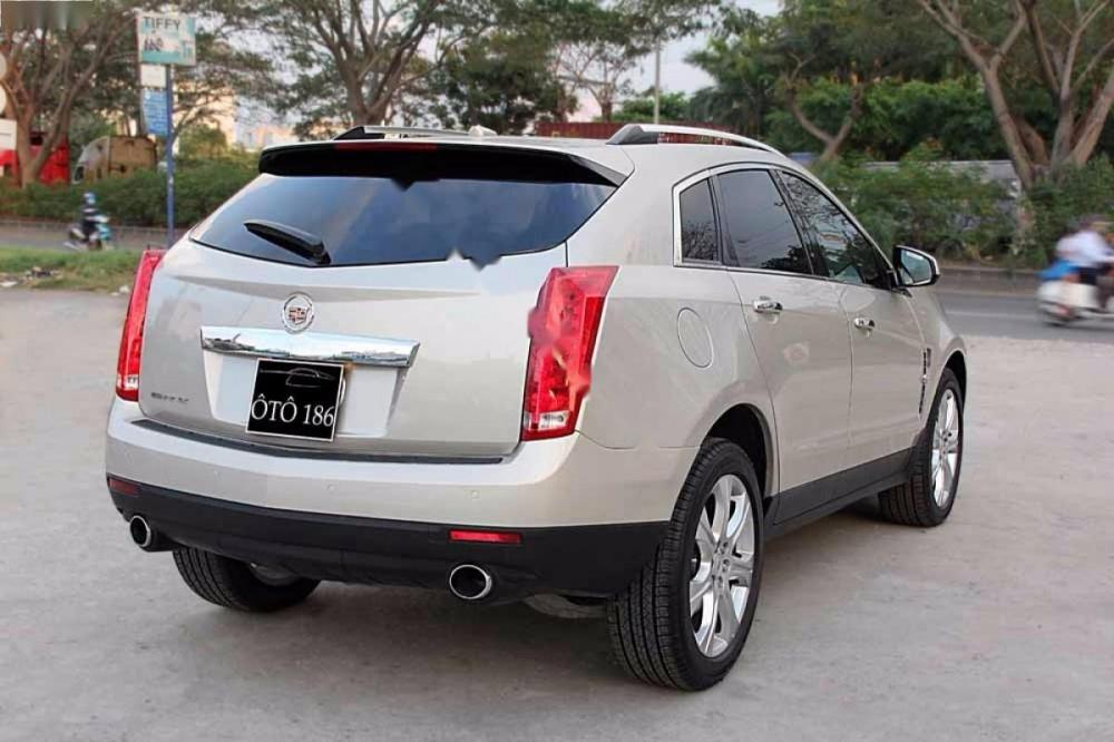 Cadillac SRX 4 2009 - Bán Cadillac SRX 4 đời 2009, màu vàng, nhập khẩu nguyên chiếc