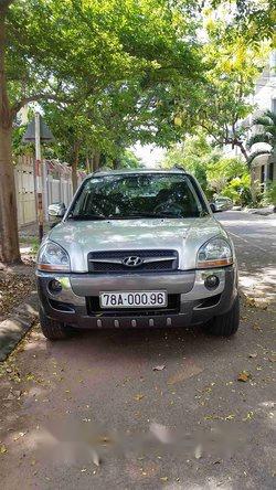 Hyundai Tucson   2009 - Bán xe cũ Hyundai Tucson sản xuất 2009, màu bạc số tự động