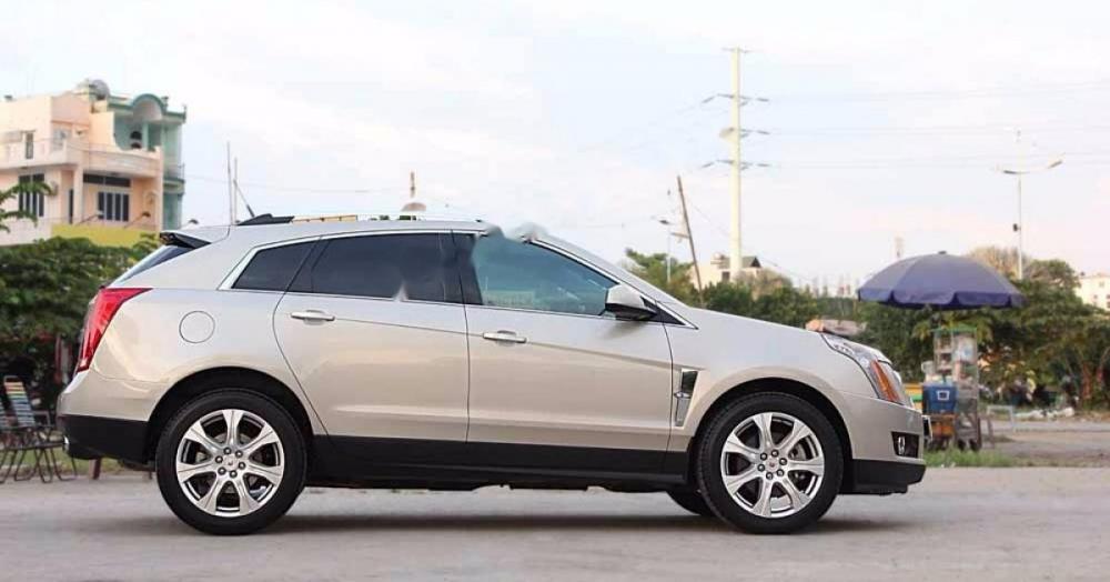Cadillac SRX 4 2009 - Bán Cadillac SRX 4 đời 2009, màu vàng, nhập khẩu nguyên chiếc
