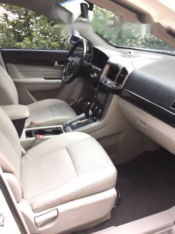 Chevrolet Captiva AT 2014 - Cần bán Chevrolet Captiva AT sản xuất 2014, màu trắng , 610tr