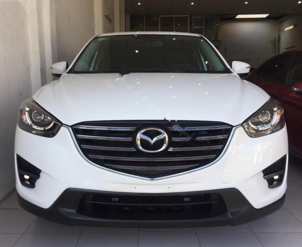 Mazda CX 5 2.0 AT FaceLift 2016 - Bán Mazda CX 5 2.0 AT FaceLift sản xuất 2016, màu trắng, 810 triệu
