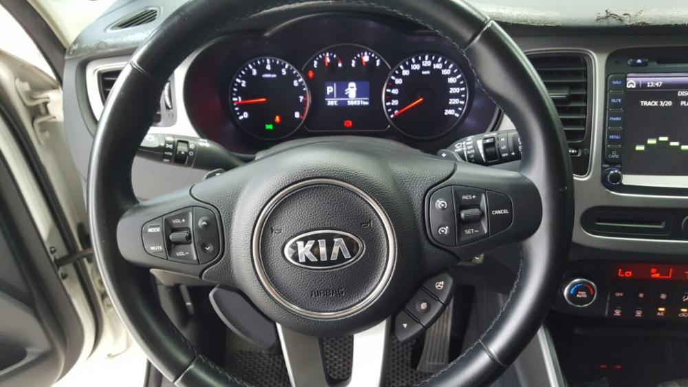 Kia Rondo GAT 2.0AT 2014 - Bán Kia Rondo Gat 2.0 AT màu trắng, số tự động, sản xuất T12/2014 biển tỉnh, lăn bánh 56000km