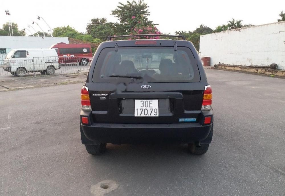 Ford Escape XLT 2004 - Bán Ford Escape XLT sản xuất 2004, màu đen 