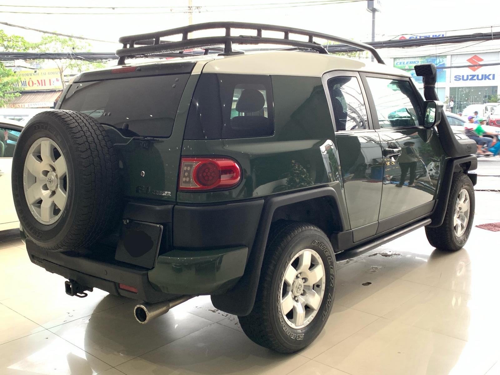 Toyota Fj cruiser 4.0L V6 2008 - Bán xe Toyota Fj cruiser 4.0L V6 đk 2008, màu xanh lục, nhập khẩu, độ cực đẹp.