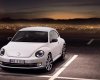Volkswagen New Beetle E 2016 - Cần bán xe Volkswagen New Beetle E đời 2016, màu vàng, nhập khẩu chính hãng