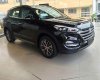 Hyundai Tucson 2.0 2016 - Cần bán Hyundai Tucson 2.0 đời 2016, màu đen