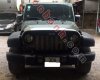 Jeep Wrangler Unlimited Sport 2010 - Cần bán gấp Jeep Wrangler Unlimited Sport 2010, màu đen, xe nhập chính chủ