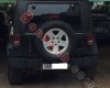 Jeep Wrangler Unlimited Sport 2010 - Cần bán gấp Jeep Wrangler Unlimited Sport 2010, màu đen, xe nhập chính chủ