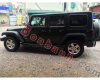 Jeep Wrangler Unlimited Sport 2010 - Cần bán gấp Jeep Wrangler Unlimited Sport 2010, màu đen, xe nhập chính chủ