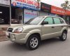 Hyundai Tucson 4WD 2009 - Cần bán Hyundai Tucson 4WD đời 2009, màu vàng, nhập khẩu