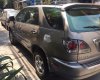 Lexus RX 300 2002 - Cần bán gấp Lexus RX 300 đời 2002, màu vàng, nhập khẩu nguyên chiếc còn mới, giá chỉ 650 triệu