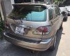 Lexus RX 300 2002 - Cần bán gấp Lexus RX 300 đời 2002, màu vàng, nhập khẩu nguyên chiếc còn mới, giá chỉ 650 triệu