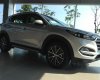 Hyundai Tucson 2016 - Cần bán Hyundai Tucson năm 2016 màu bạc, giá tốt
