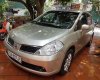 Nissan Tiida 1.4MT 2007 - Bán ô tô Nissan Tiida 1.4MT đời 2007, màu vàng, xe nhập số sàn