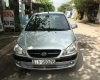 Hyundai Getz MT 2009 - Cần bán gấp Hyundai Getz MT đời 2009, màu bạc