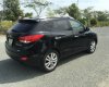 Hyundai Tucson 4WD 2010 - Bán Hyundai Tucson 4WD năm 2010, màu đen, nhập khẩu nguyên chiếc, còn mới