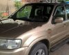 Ford Escape 3.0 V6 2002 - Bán xe Ford Escape 3.0 V6 2002, màu vàng cát