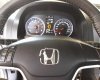 Honda CR V 2.4 AT 2009 - Cần bán Honda CR V 2.4AT đời 2009, màu xám chính chủ