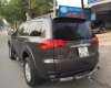 Mitsubishi Pajero Sport 2.5AT 2013 - Cần bán Mitsubishi Pajero Sport 2.5AT sản xuất năm 2013, màu nâu còn mới