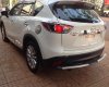 Mazda CX 5 2014 - Cần bán lại xe Mazda CX 5 2014, màu trắng còn mới, 740tr