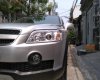 Chevrolet Captiva MT 2009 - Cần bán Chevrolet Captiva MT 2009, màu bạc, giá 295tr