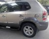 Hyundai Tucson 2009 - Bán Hyundai Tucson sản xuất 2009, màu vàng