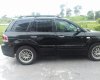 Hyundai Santa Fe Gold 2005 - Bán Hyundai Santa Fe Gold đời 2005 độ ngoại thất đẹp, màu đen, nhập khẩu nguyên chiếc