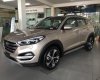 Hyundai Tucson   2018 - Bán xe Hyundai Tucson năm sản xuất 2018, màu vàng