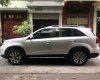 Kia Sorento AT 2014 - Cần bán Kia Sorento AT năm 2014, màu bạc số tự động, giá chỉ 715 triệu