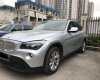 BMW X1 2012 - Cần bán BMW X1 sản xuất 2012, màu bạc, nhập khẩu, 586 triệu