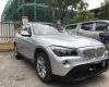 BMW X1 2012 - Cần bán BMW X1 sản xuất 2012, màu bạc, nhập khẩu, 586 triệu