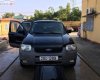 Ford Escape 2.0 4x4 Auto MT  2003 - Cần bán lại xe Ford Escape 2.0 4x4 Auto MT sản xuất 2003, màu đen