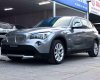 BMW X1 2010 - Bán xe BMW X1 sản xuất 2010 màu xám (ghi), giá 587 triệu, xe nhập