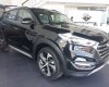 Hyundai Tucson   2018 - Bán Hyundai Tucson sản xuất năm 2018, màu đen, 902 triệu