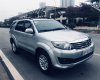 Toyota Fortuner V 2014 - Gia đình bán chiếc Fortuner 2.7V đời 2014, xe 1 chủ gia đình mua từ mới tinh