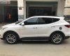 Hyundai Santa Fe 2.4L 4WD 2016 - Cần bán gấp Hyundai Santa Fe 2.4L 4WD sản xuất 2016, màu trắng, xe gia đình đi kỹ