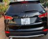 Hyundai Santa Fe 2015 - Cần bán lại xe Hyundai Santa Fe sản xuất 2015, màu đen 