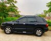 Hyundai Santa Fe 2004 - Bán ô tô Hyundai Santa Fe sản xuất năm 2004, màu đen, xe nhập