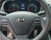 Kia K3 1.6 AT  2013 - Bán Kia K3 1.6 AT số tự động model 2014, Sx 2013, màu vàng 1 đời chủ mới 90%