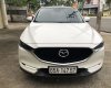 Mazda CX 5 2.5AT AWD 2018 - Bán Mazda CX5 2.5AT AWD màu trắng camay, số tự động, sản xuất 2018 đi 26000km