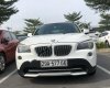 BMW X1 2011 - Chính chủ bán BMW X1 màu trắng, đời 2011, đăng ký lần đầu T7/2012, chạy 7,8 vạn