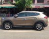 Hyundai Tucson 2.0 2018 - Cần bán gấp Hyundai Tucson 2.0 năm 2018, màu nâu còn mới