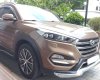 Hyundai Tucson ATH 2015 - Hãng bán Tucson ATH 2015, màu nâu, xe nhập, đúng chất, giá TL, hỗ trợ góp