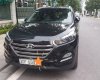 Hyundai Tucson 2018 - Bán Hyundai Tucson đời 2018, màu đen xe gia đình