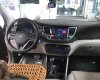 Hyundai Tucson 2016 - Cần bán xe Hyundai Tucson 2.0 AT đời 2016, màu nâu, xe nhập chính hãng