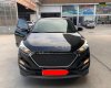 Hyundai Tucson   2017 - Bán ô tô Hyundai Tucson sản xuất 2017, màu đen số tự động, giá tốt xe còn mới lắm
