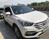 Hyundai Santa Fe 2017 - Cần bán gấp Hyundai Santa Fe đời 2017, màu trắng, xe còn mới lắm
